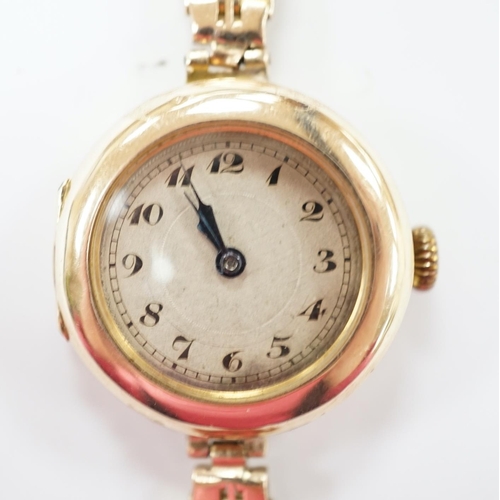 1959 - A lady's early to mid 20th century 9ct gold manual wind wrist watch(a.f.), on a yellow metal bracele... 