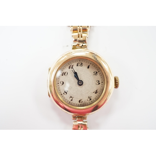 1959 - A lady's early to mid 20th century 9ct gold manual wind wrist watch(a.f.), on a yellow metal bracele... 