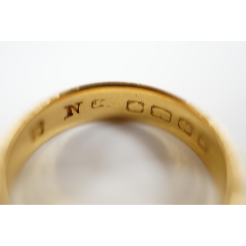 1960 - A 22ct. gold wedding band, size N, 7.2 grams.