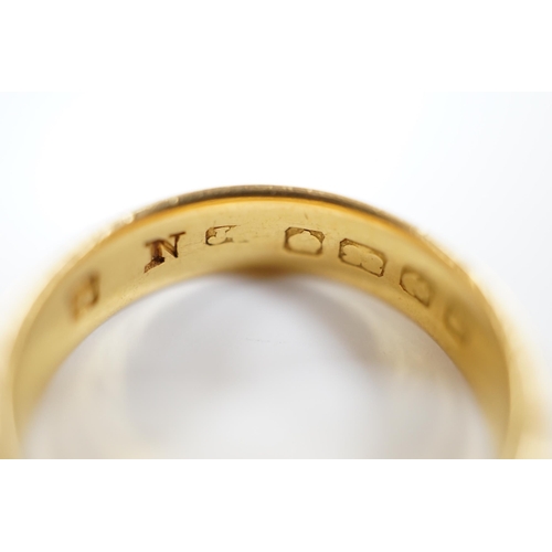 1960 - A 22ct. gold wedding band, size N, 7.2 grams.