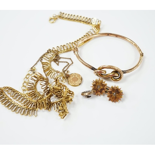 1961 - A 9ct. gold fringe necklace, 49cm(a.f.) a 9ct. gold bangle, 25.9 grams, a gold plated locket on a go... 