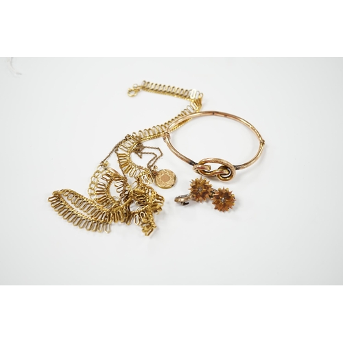 1961 - A 9ct. gold fringe necklace, 49cm(a.f.) a 9ct. gold bangle, 25.9 grams, a gold plated locket on a go... 