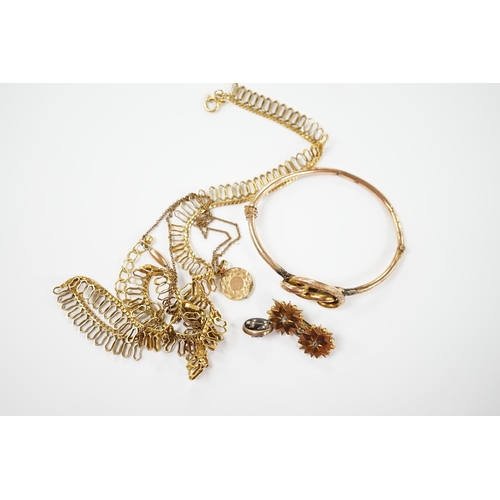 1961 - A 9ct. gold fringe necklace, 49cm(a.f.) a 9ct. gold bangle, 25.9 grams, a gold plated locket on a go... 