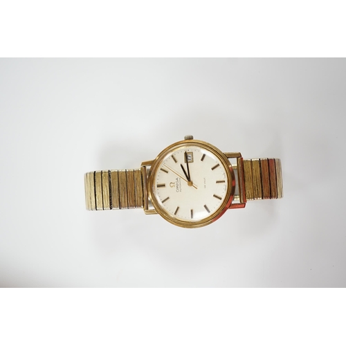 1988 - A gentleman's yellow metal Omega De Ville automatic wrist watch, with baton numerals and date apertu... 