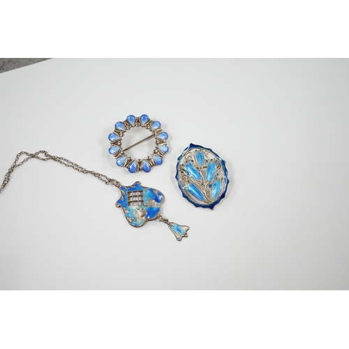 1990 - A George V silver and enamel set drop pendant (a.f.), 40mm on a white metal chain and two white meta... 