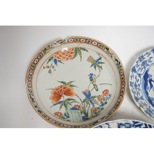 1282 - A Chinese blue and white warriors bowl, Kangxi mark and period, a similar hunting saucer dish, a... 