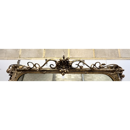 14 - A large Victorian giltwood and composition wall mirror, width 180cm, height 238cm