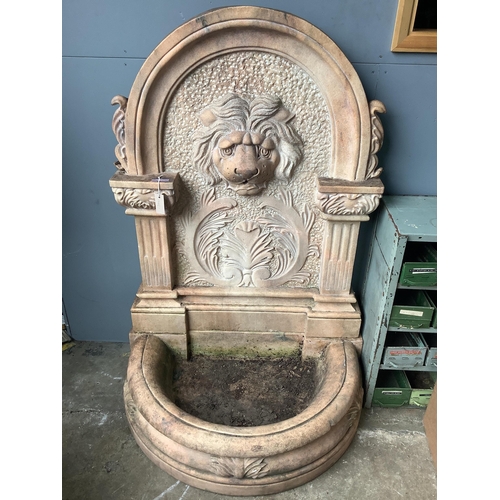 1001 - An Italian rose marble garden fountain with lion mask spout, width 94cm, height 135cm