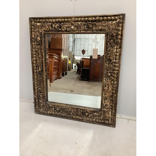 1021 - An Eastern rectangular carved hardwood wall mirror, width 71cm, height 81cm