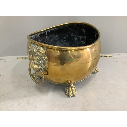 1037 - A 19th century Dutch oval and brass coal bin with lion mask ring handles, width 54cm, depth 40cm, he... 