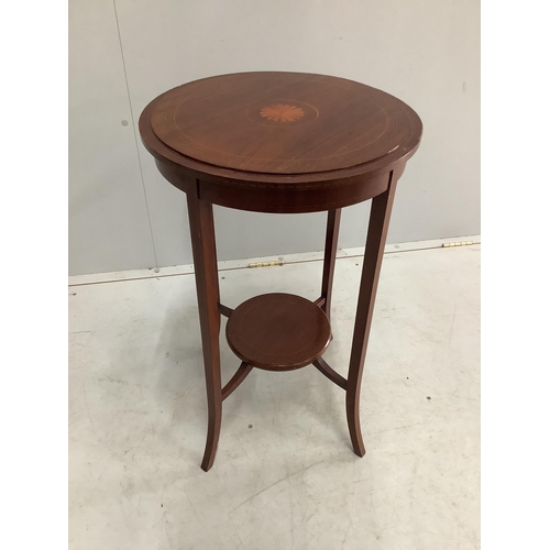 1053 - An Edwardian inlaid mahogany circular tray top occasional table, diameter 51cm, height 73cm