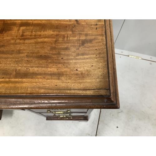 1058 - A George III and later mahogany kneehole desk with secretaire drawer, width 85cm, depth 52cm, height... 