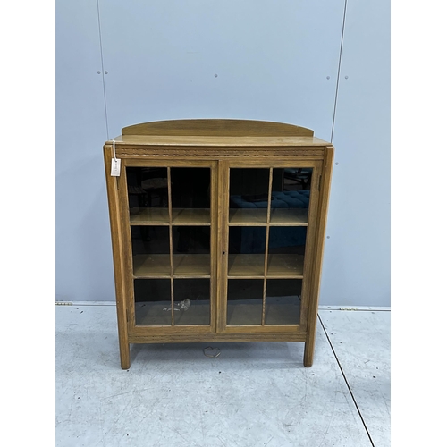 1059 - An early 20th century bleached oak glazed bookcase, width 91cm, depth 28cm, height 114cm