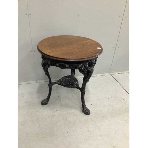 1063 - A Victorian circular cast iron and mahogany Britannia pub table, diameter 62cm, height 72cm