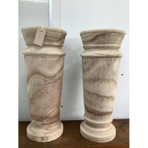 1077 - A pair of turned wood vases, height 53cm