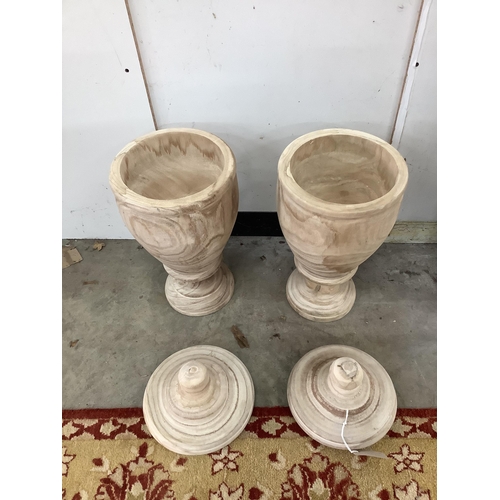 1121 - A pair of modern turned wood lidded urns, height 55cm