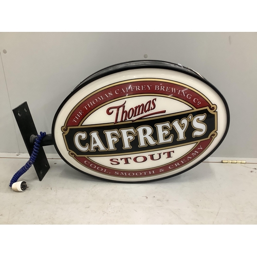 1125 - A Caffrey's illuminated double sided pub sign, width with bracket 75cm, height 46cm