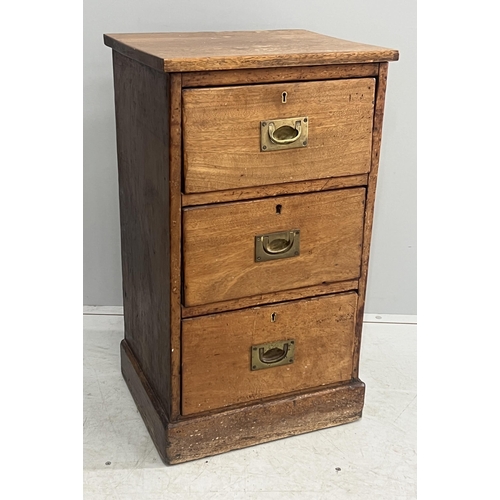 1131 - A Victorian mahogany three drawer bedside chest, adapted, width 42cm, depth 35cm, height 74cm