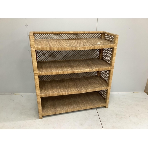 1137 - A wicker four tier shelving unit, width 121cm, depth 46cm, height 129cm