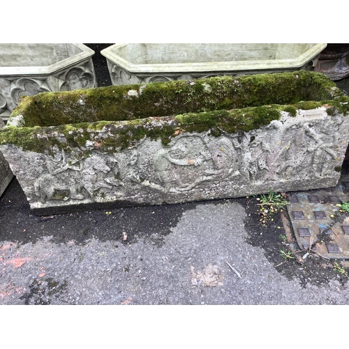 1154 - A pair of rectangular reconstituted stone garden trough planters, moulded with classical figures, wi... 