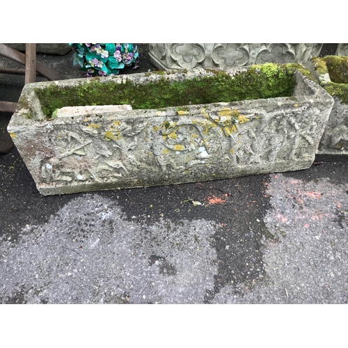 1154 - A pair of rectangular reconstituted stone garden trough planters, moulded with classical figures, wi... 