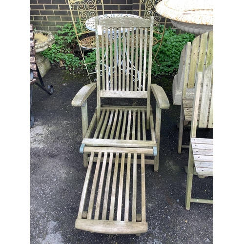 1160 - A set of four Alexander Rose teak folding garden elbow chairs, an Alexander Rose teak steamer chair ... 