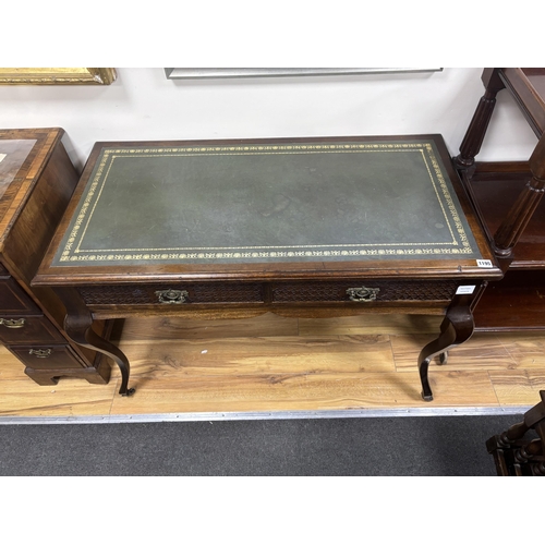 1195 - A late Victorian mahogany two drawer writing table, width 110cm, depth 54cm, height 73cm