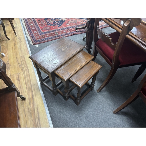 1196 - A nest of three 18th century style rectangular oak tea tables stamped CC41, utility furniture, width... 