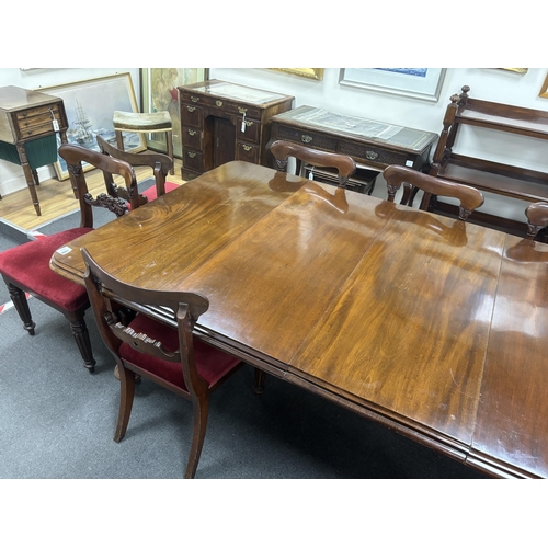 1205 - A Victorian mahogany extending dining table, 232cm extended, two spare leaves, depth 118cm, height 7... 