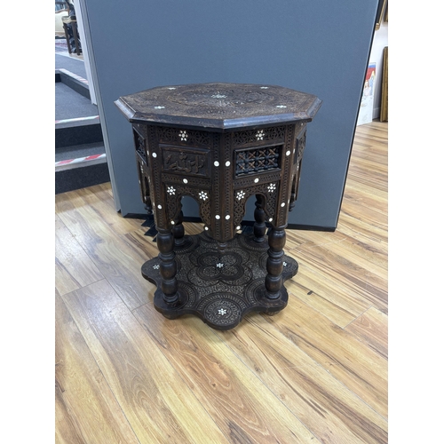 1207 - A Moroccan octagonal bone inlaid hardwood table, width 52cm, height 64cm