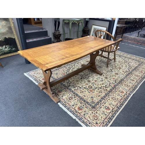 1211 - An Arts & Crafts style rectangular oak refectory dining table, width 175cm, depth 73cm, height  73cm... 