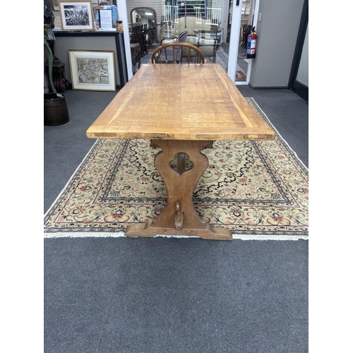 1211 - An Arts & Crafts style rectangular oak refectory dining table, width 175cm, depth 73cm, height  73cm... 