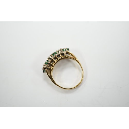 1942 - A modern 18ct, emerald and diamond set cluster half hoop ring, size O, gross weight 4.9 grams.... 