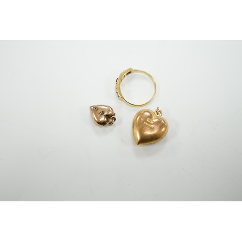 1945 - Two late Victorian 9ct and gem set heart pendants and an 18ct and gem set ring.