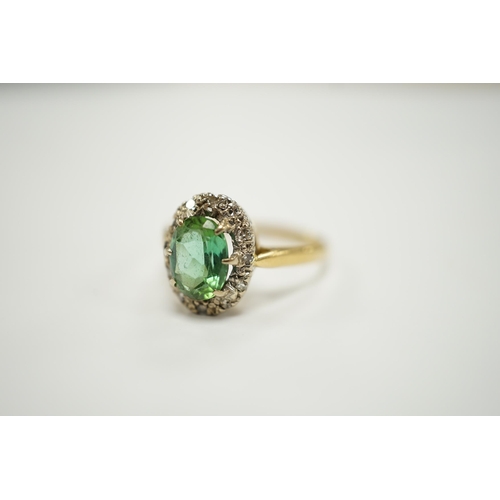 1946 - A modern 18ct gold, green tourmaline and diamond set oval cluster ring, size O/P, gross weight 3.5 g... 