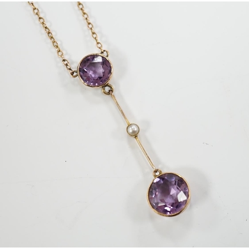 1948 - An Edwardian 9ct, two stone amethyst and single stone seed pearl set drop pendant necklace, gross we... 