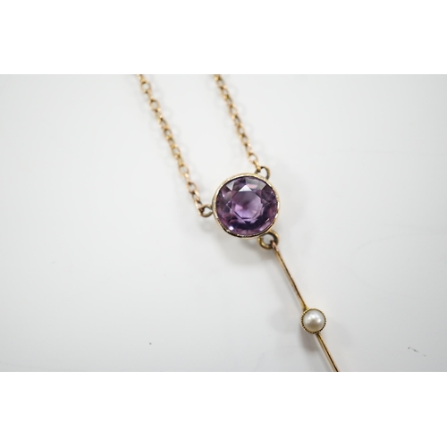 1948 - An Edwardian 9ct, two stone amethyst and single stone seed pearl set drop pendant necklace, gross we... 