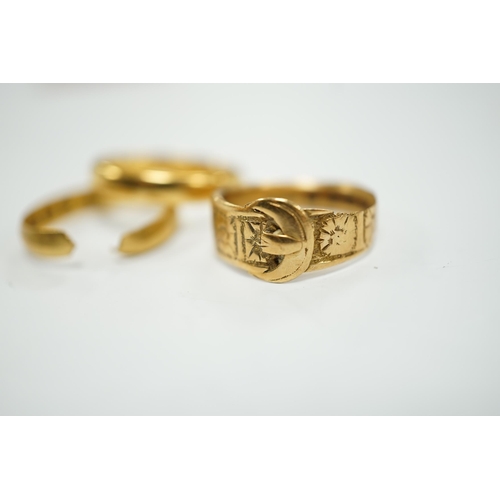 1964 - Two 22ct gold wedding bands (one cut), 5.8 grams and an 18ct gold buckle ring, 2.9 grams.