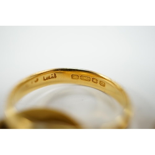 1964 - Two 22ct gold wedding bands (one cut), 5.8 grams and an 18ct gold buckle ring, 2.9 grams.