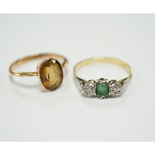 1965 - A 750, single stone emerald and two stone illusion set diamond ring and a 9ct and citrine set ring.... 