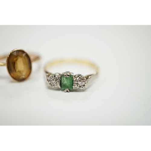 1965 - A 750, single stone emerald and two stone illusion set diamond ring and a 9ct and citrine set ring.... 