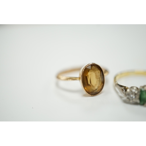 1965 - A 750, single stone emerald and two stone illusion set diamond ring and a 9ct and citrine set ring.... 