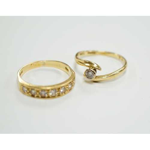 1966 - A modern 18ct gold and graduated seven stone diamond set half hoop ring, size O and a similar solita... 