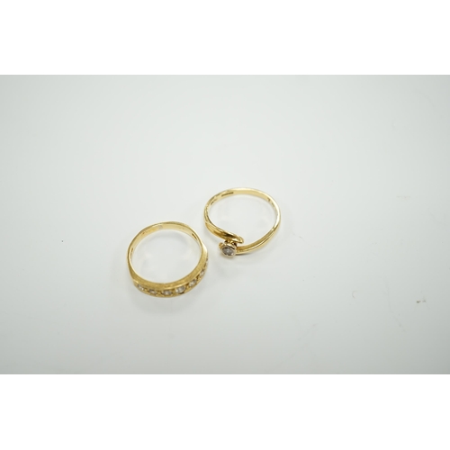 1966 - A modern 18ct gold and graduated seven stone diamond set half hoop ring, size O and a similar solita... 