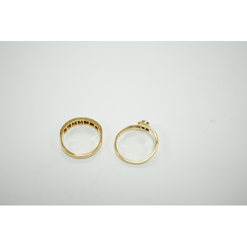 1966 - A modern 18ct gold and graduated seven stone diamond set half hoop ring, size O and a similar solita... 