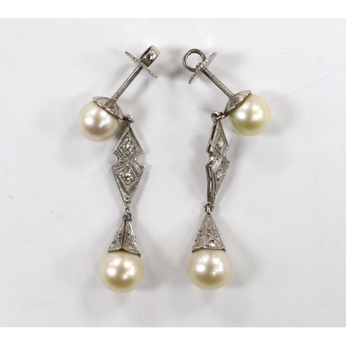 1977 - A pair of white metal, two stone cultured pearl and two stone diamond chip set drop earrings, 37mm, ... 