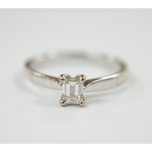 1978 - A modern 18ct white gold and solitaire emerald cut diamond set ring, size Q, gross weight 3.4 grams.... 