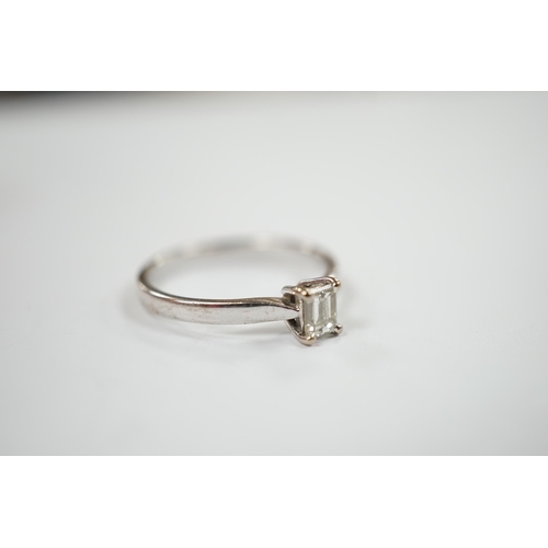 1978 - A modern 18ct white gold and solitaire emerald cut diamond set ring, size Q, gross weight 3.4 grams.... 