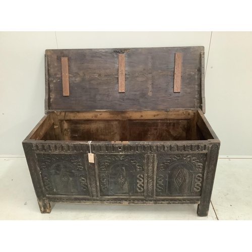 105 - A 17th century style oak coffer, width 127cm, depth 53cm, height 64cm