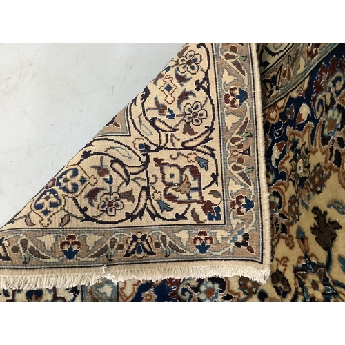 109 - A fine Nain ivory ground carpet, 290 x 192cm